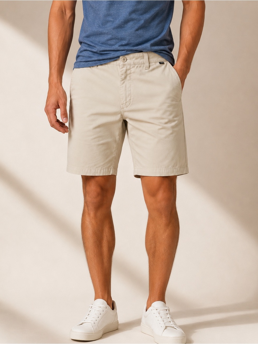 Travis Mathew Men's Flat-Front Chino Shorts in light green.
